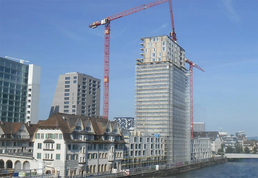 Die Hochhäuser beim Escher-Wyss-Platz, Plakat vor der Volksabstimmung und die Hochhäuser im Bau (Fotos Heinrich Frei)