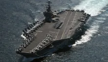 USS Harry S. Truman navigating the Persian Gulf. Photo: Ryan O'Connor / U.S. Navy / Public Domain - Photo: 2026